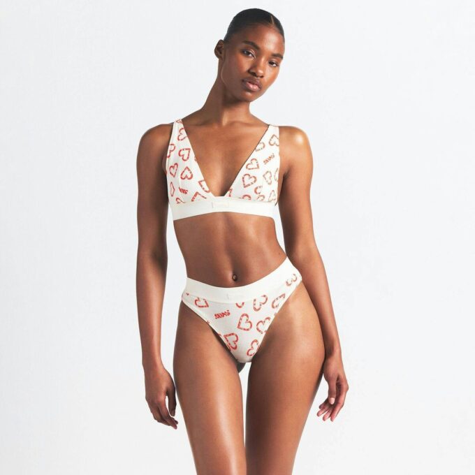 BRALETTE MIT BAUMWOLLRIPPEN UND PLING-AUSSCHNITT BRALETTE MIT BAUMWOLLRIPPEN UND PLING-AUSSCHNITT