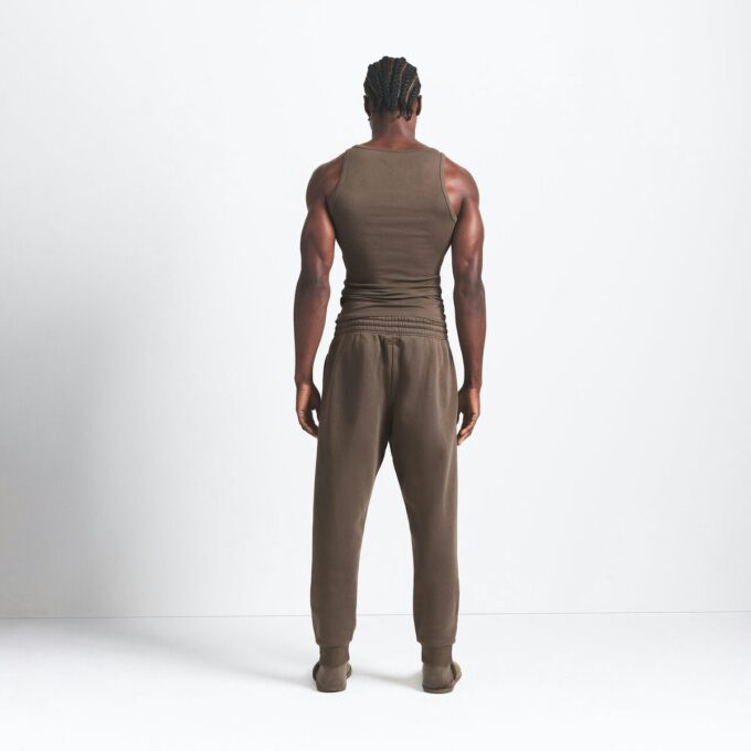 Fleece-Lounge-Herren-Jogginghose mit schmal zulaufendem Bein Fleece-Lounge-Herren-Jogginghose mit schmal zulaufendem Bein