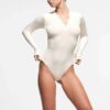 Langarm-Henley-Body aus Baumwollripp Langarm-Henley-Body aus Baumwollripp