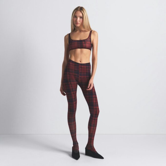Milchfarbene, transparente Leggings mit Fuß