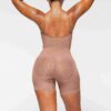 Nahtloser Body mit geformter Mitte des Oberschenkels Nahtloser Body mit geformter Mitte des Oberschenkels