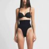Nahtloser, formgebender Slip mit mittelhohem Bund Nahtloser, formgebender Slip mit mittelhohem Bund