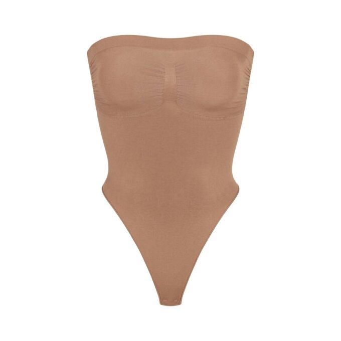 Nahtloser, trägerloser String-Body mit formgebender Silhouette Nahtloser, trägerloser String-Body mit formgebender Silhouette