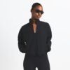 NikeSKIMS GEWEBTE NYLON-JACKE MIT HALBREISSVERSCHLUSS