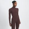 NikeSKIMS VINTAGE NAHTLOSES MOCK NECK CROP TOP NikeSKIMS VINTAGE NAHTLOSES MOCK NECK CROP TOP